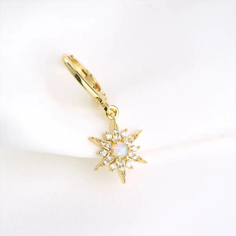 Single earring opal star