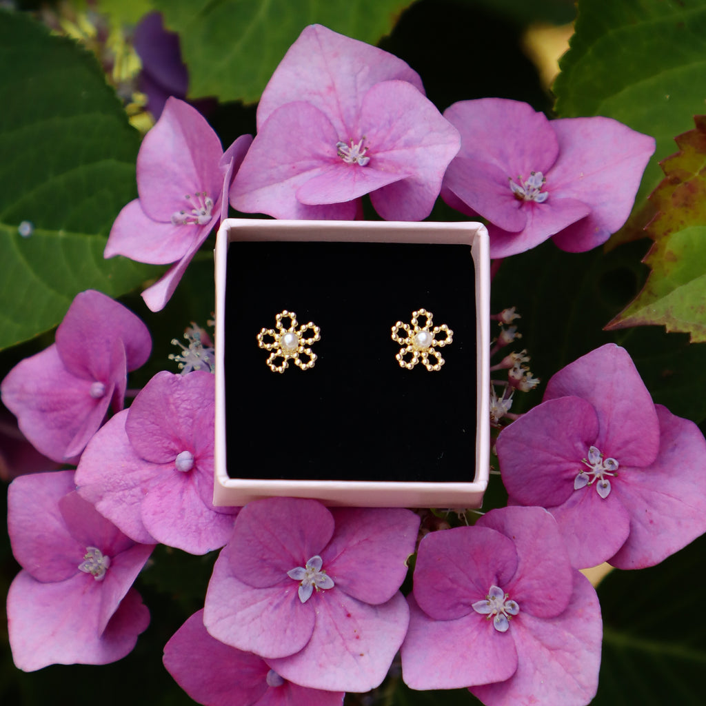 Pearly flower studs